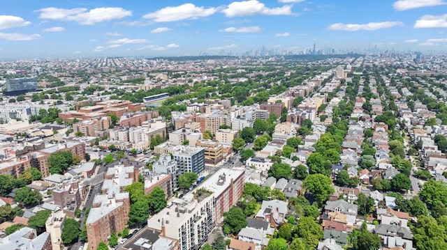 birds eye view of property with a city view