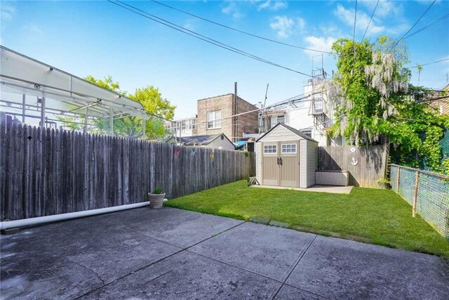 exterior space with a storage shed