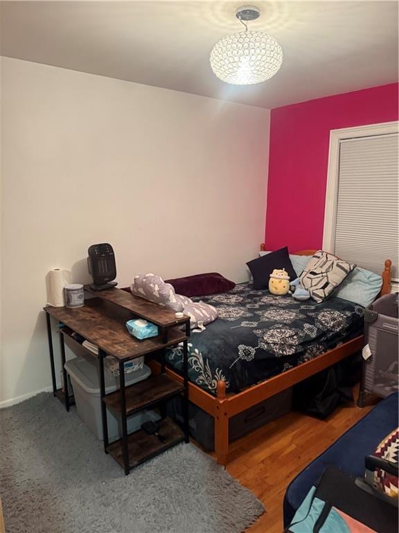 bedroom featuring baseboards