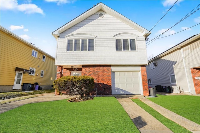 view of front of home with a garage, a front yard, brick siding, and driveway