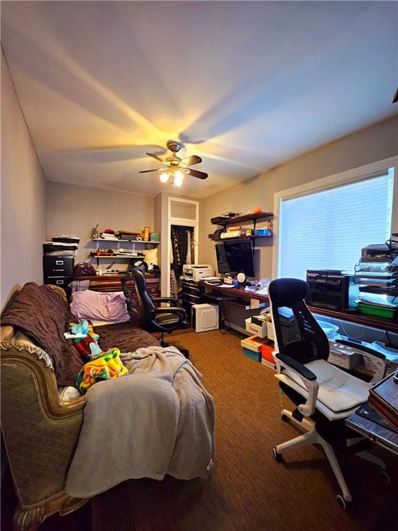 office space featuring ceiling fan and carpet flooring