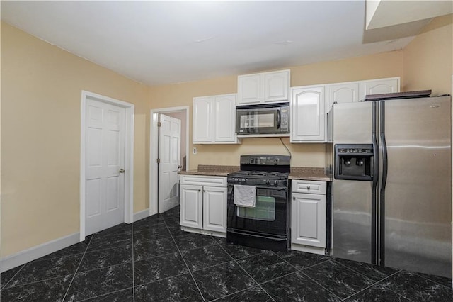 kitchen featuring white cabinetry and black appliances