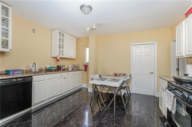 kitchen with white cabinetry, sink, and black appliances