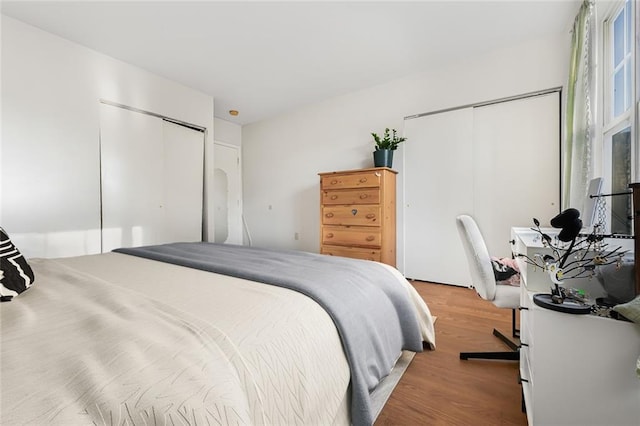 bedroom featuring wood finished floors