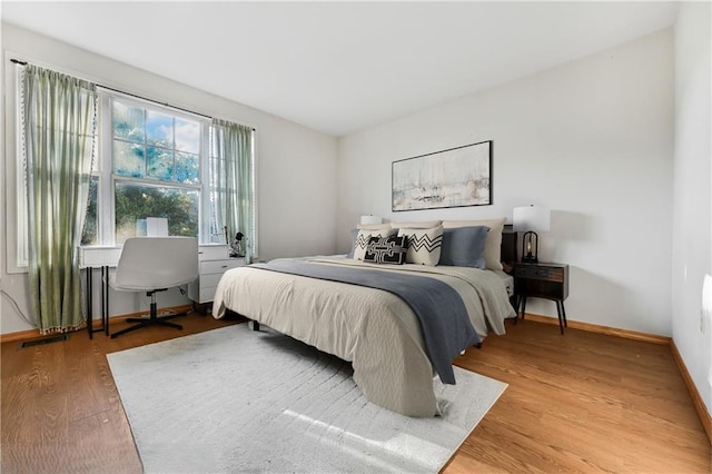 547 Sheffield Ave, Brooklyn, NY 11207 - bedroom with wood finished floors and baseboards