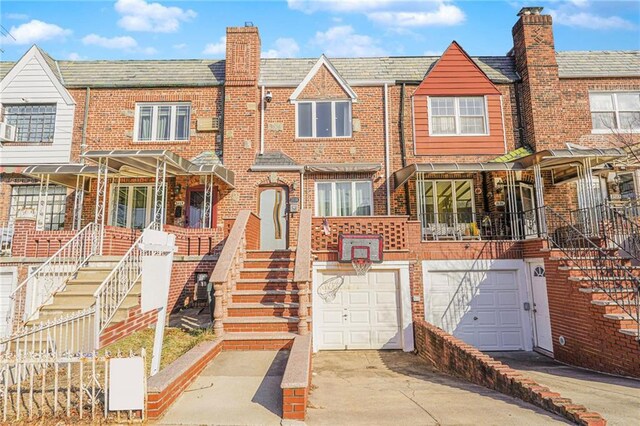 townhome / multi-family property featuring a garage