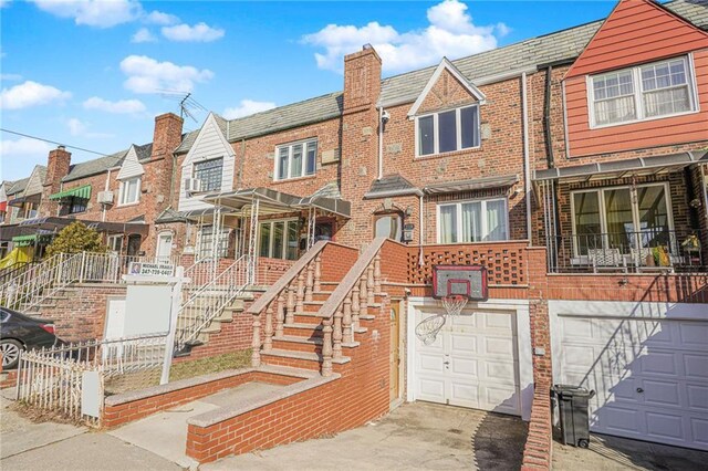 view of front of property with a garage