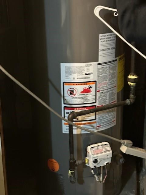 6311 13th Ave, Brooklyn, NY 11219 - utility room featuring water heater