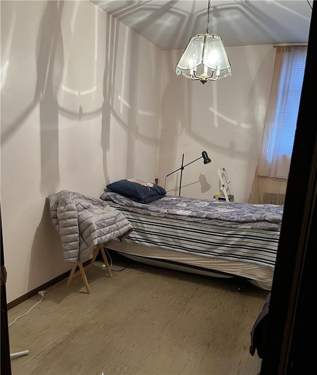 6311 13th Ave, Brooklyn, NY 11219 - bedroom featuring a chandelier