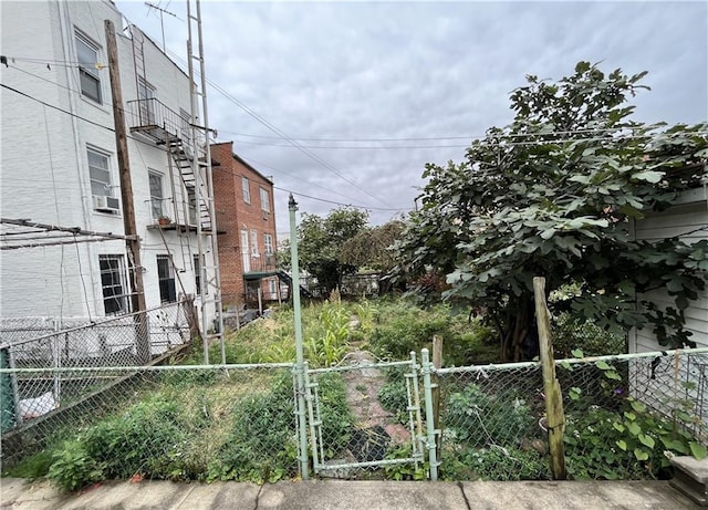 view of yard with a gate and a fenced front yard