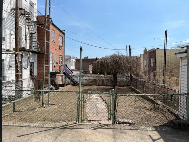 6311 13th Ave, Brooklyn, NY 11219 - view of street featuring a gate