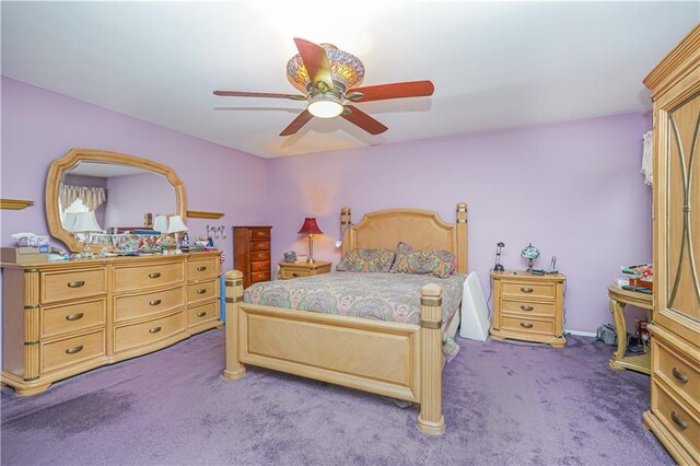 bedroom featuring ceiling fan and carpet floors