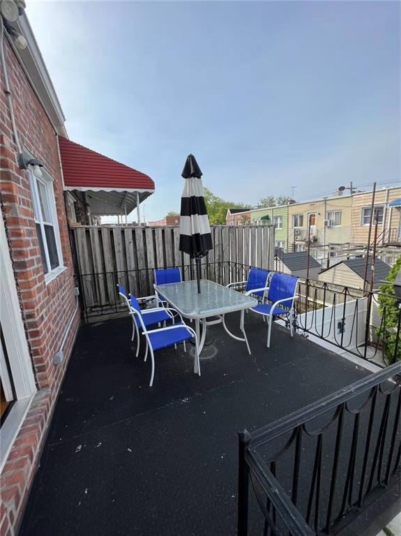 view of patio with a balcony