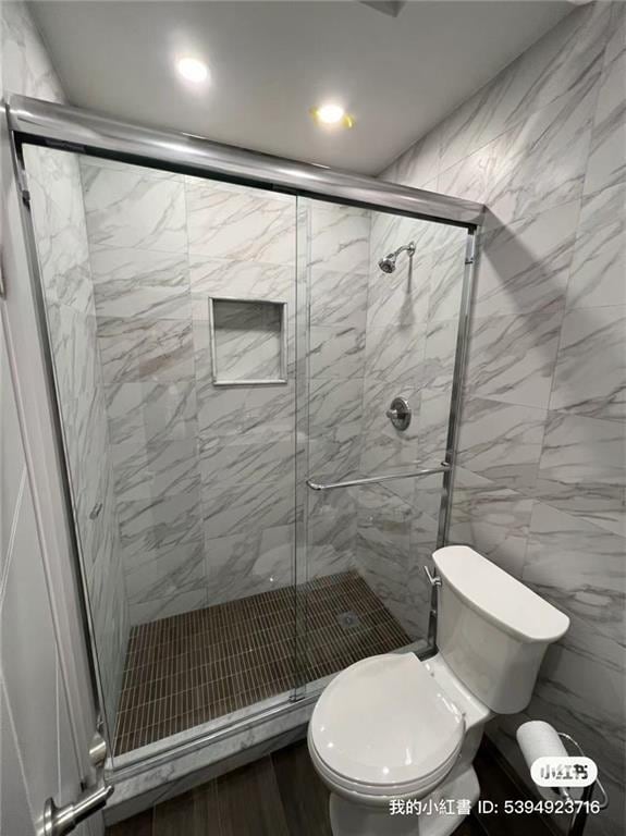 1574 E 66th St, Brooklyn, NY 11234 - full bath featuring a stall shower, toilet, and recessed lighting