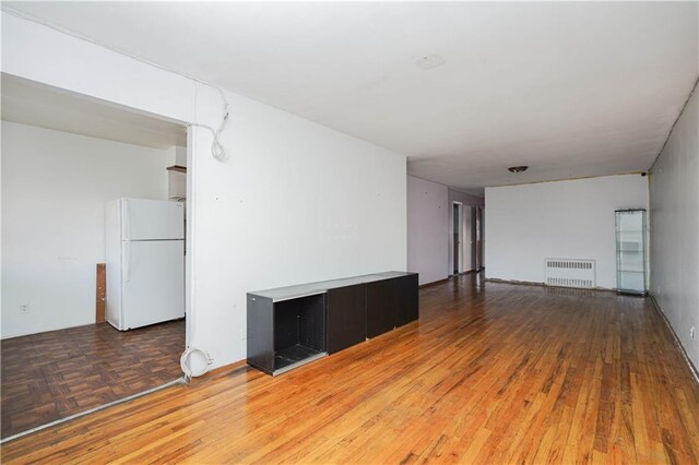 empty room featuring radiator