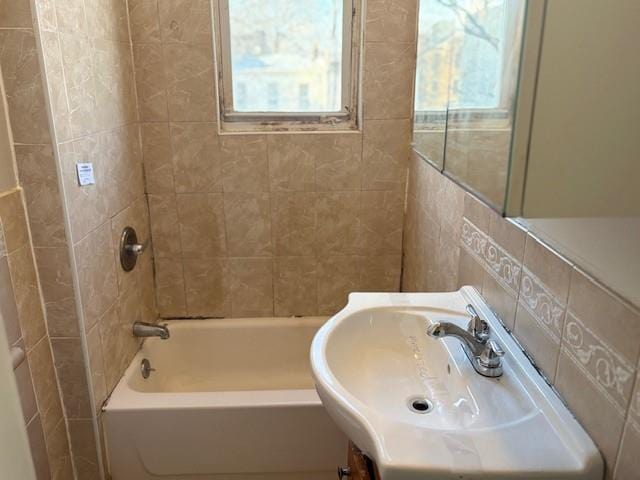 bathroom with shower / tub combination and vanity