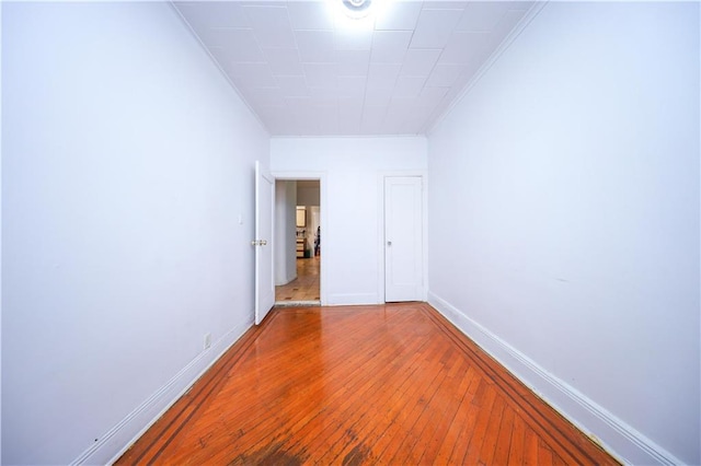 1445 W 5th St, Brooklyn, NY 11204 - unfurnished room featuring crown molding, baseboards, and hardwood / wood-style flooring