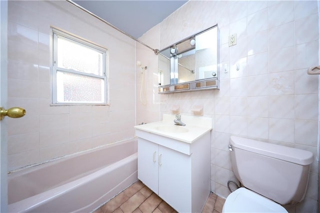 1445 W 5th St, Brooklyn, NY 11204 - bathroom featuring toilet, tile walls, shower / tub combination, and vanity