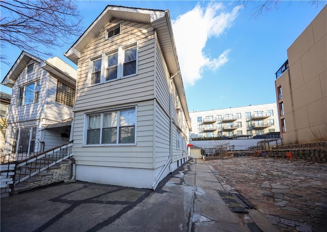 1445 W 5th St, Brooklyn, NY 11204 - exterior space with a patio area
