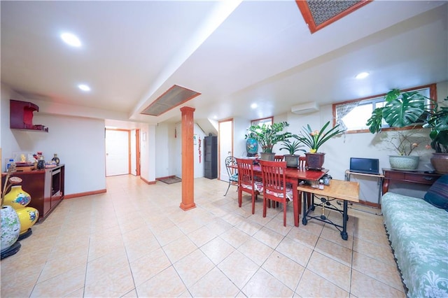 1445 W 5th St, Brooklyn, NY 11204 - living room with light tile patterned flooring, baseboards, recessed lighting, ornate columns, and a wall mounted AC