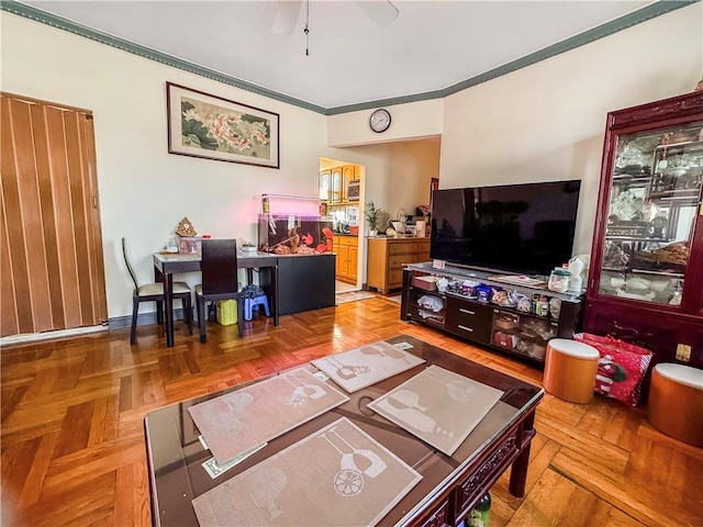 living room featuring parquet flooring and ornamental molding