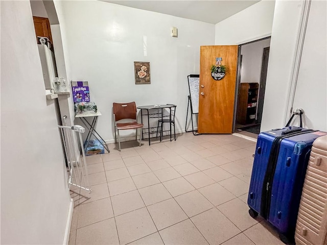 living area featuring light tile patterned floors