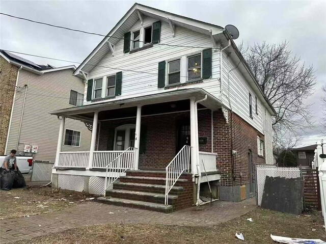 view of front of home featuring covered porch