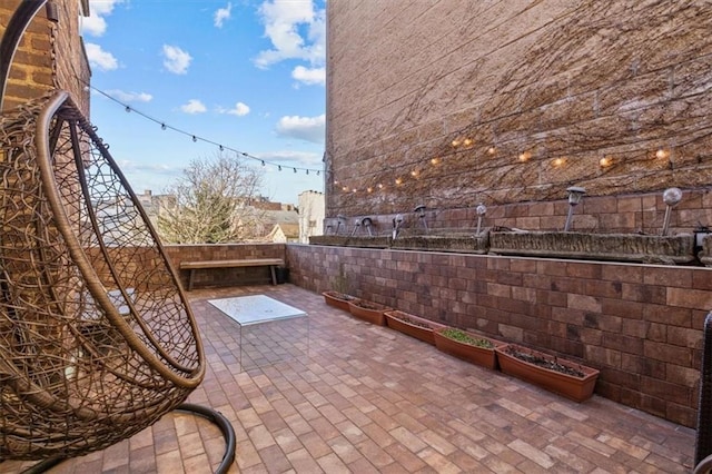 view of patio with fence