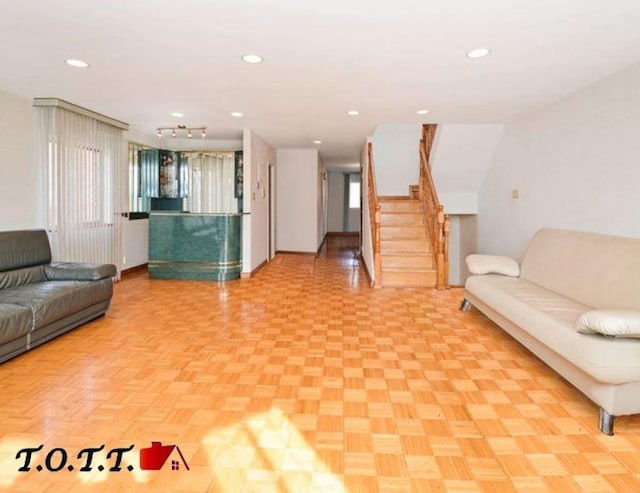 living room with light parquet flooring