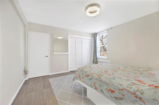 bedroom featuring hardwood / wood-style flooring