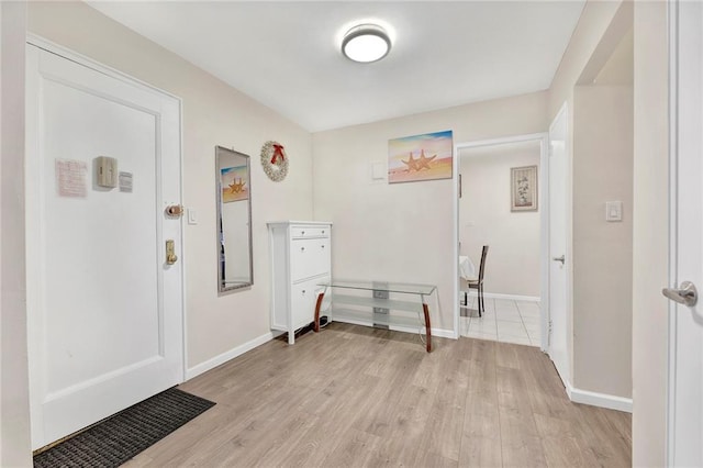 foyer with light wood-type flooring