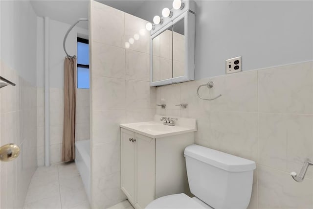 7609 4th Ave Unit C11, Brooklyn, NY 11209 - bathroom with tile walls, toilet, vanity, and shower / tub combo with curtain