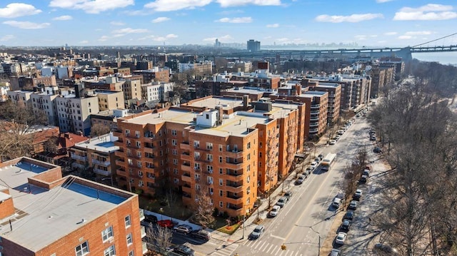 birds eye view of property with a view of city