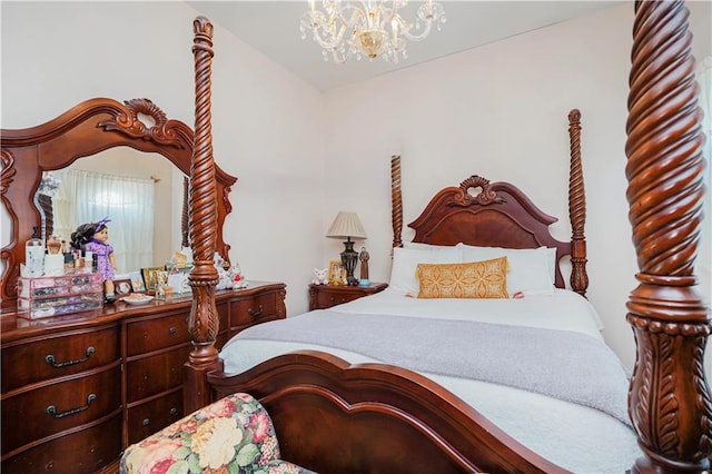 bedroom with a notable chandelier