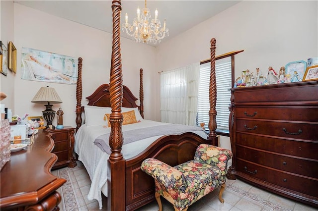 bedroom with a chandelier and light tile patterned floors