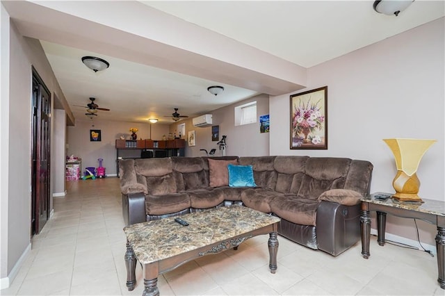 living room featuring a ceiling fan, an AC wall unit, light tile patterned flooring, and baseboards