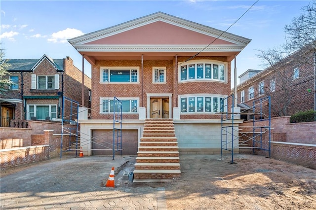 view of front of home with a garage