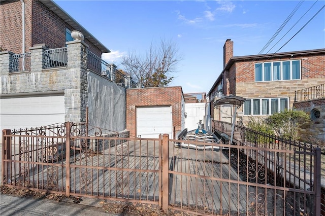 view of side of home with a balcony