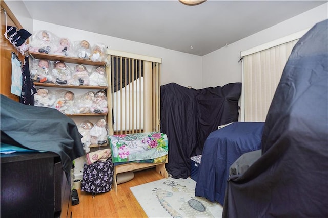 bedroom with wood-type flooring