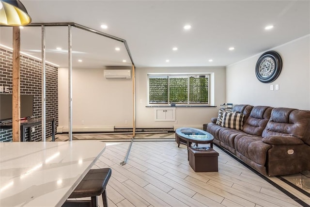 living room featuring a wall mounted AC and light hardwood / wood-style floors