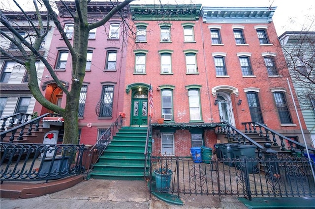 view of property with a fenced front yard