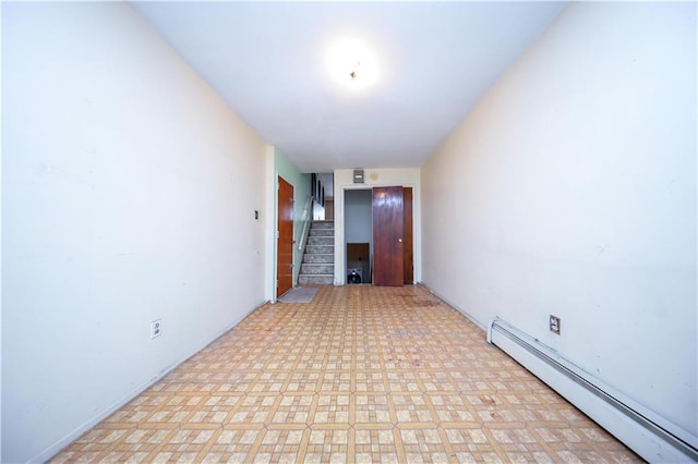 hallway with a baseboard radiator