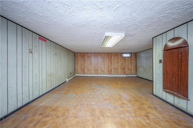 basement with a textured ceiling