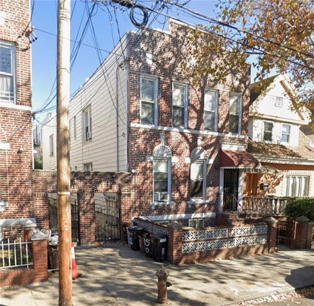 view of front of house featuring brick siding