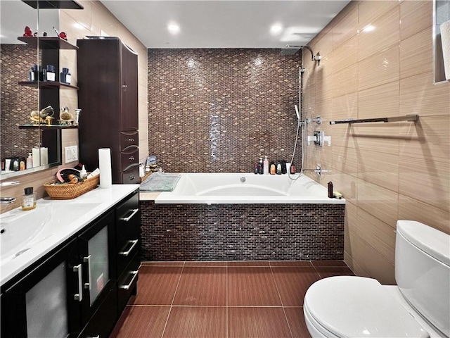 4912 Surf Ave, Brooklyn, NY 11224 - bathroom featuring tile walls, vanity, tiled tub, toilet, and a tile shower