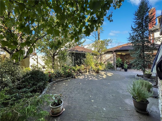 4912 Surf Ave, Brooklyn, NY 11224 - view of yard with a patio area