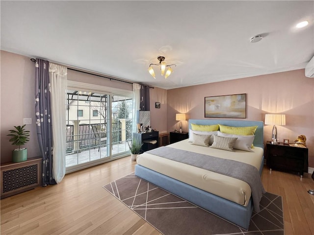 4912 Surf Ave, Brooklyn, NY 11224 - bedroom with light wood finished floors, access to outside, and radiator