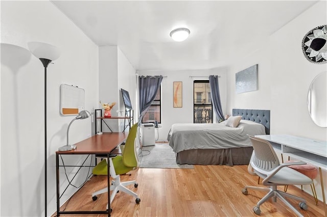 bedroom featuring hardwood / wood-style floors