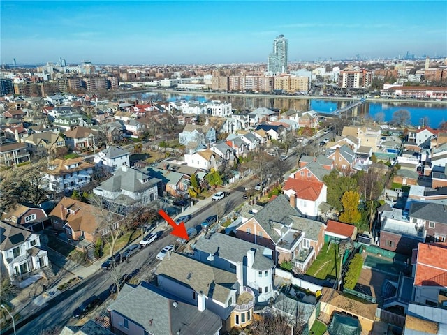 bird's eye view with a water view and a view of city