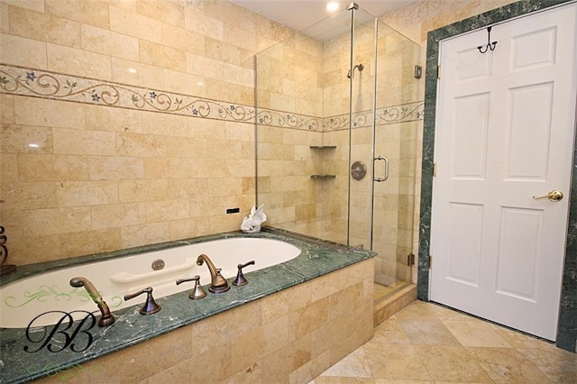 full bath with a shower stall and a bath